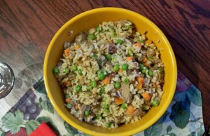 brown rice pilaf with mushrooms, peas and carrots