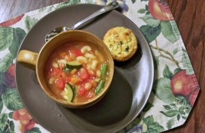 bowl of delicious minestrone soup on plate with spoon and crackers, soup recipes, healthy recipes