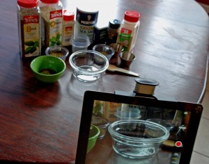 upper desk tablet holder, italian seasoning, tablet holder in kitchen, cooking with spices, organize recipes online