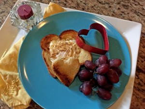 mothers day breakfast recipe, heart shaped egg in toast, breakfast in bed, egg, toast, grapes, candle