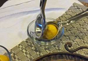 lemon half in lemon press, lemon squeezer, juice extractor, healthy recipes