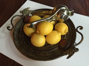 lemons with lemon press on platter, lemon recipes, healthy recipes