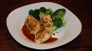 parmesan chicken with balsamic vinegar reduction, served with broccoli,