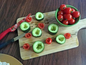 hulled tomatoes and cucumbers for spinach dip recipe