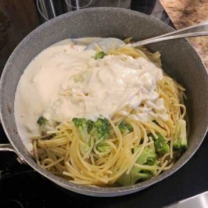 Chicken Alfredo Recipe - sauce added to skillet